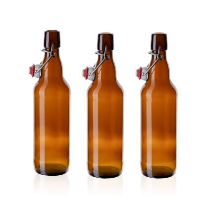 China Gift & Craft Stain Wholesale With Cap Multiple Styles Transparent Brown Beer Glass Drink Packaging Empty Wine Bottle for sale