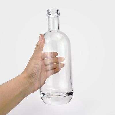 China Gift & Craft Hot Sale 750Ml Multiple Sizes Transparent Premium Spirits Bottle Logo Empty Glass Vodka Bottle Custom Made for sale