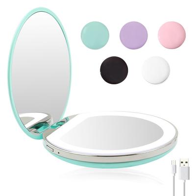 China 10x Lighted Magnifying Lighted Makeup Mirror Mini Round Portable Led Make Up Mirror Feeling Chargeable Usb Makeup Mirror for sale