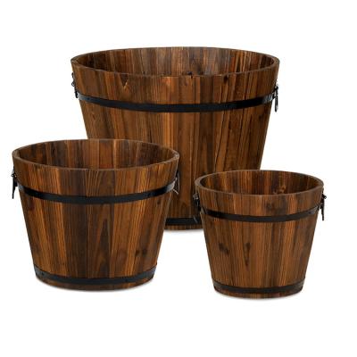 China Sturdy design drainage holes with different drainage hole sizes indoor and outdoor use wooden bucket flower pot for sale