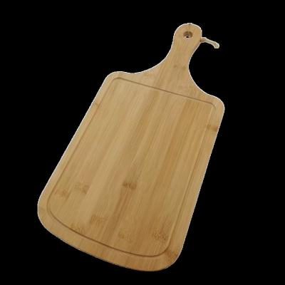 China Hot Viable Bamboo Wooden Skin Paddle Pizza Products Bamboo Cutting Board With Handle Charcuterie Cutting Plates for sale