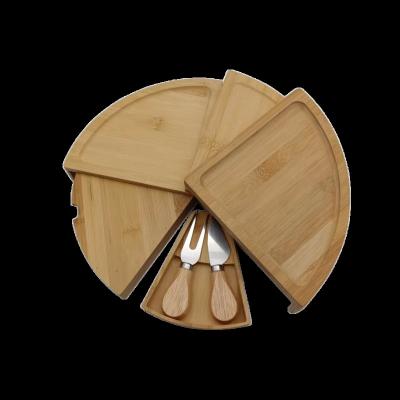 China Sustainable New Design Round Foldable 4 Tier Revolving Bamboo Cheese Board Set Bamboo Cheese Serving Tray With Slide Out Drawer for sale