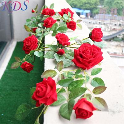 China Simple Minimalist Artificial Red Roses Flower Rose Socket For Wedding Decorated Artificial Garden Grass Wall for sale