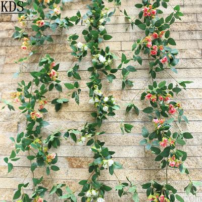 China Minimalist lusia home party wedding decoration flower rose silk wall hanging artificial flower vine fabric flower household decoration for sale