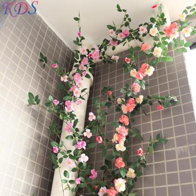 China Coastal Silk Artificial Wisteria Plants Decoration Flower Garland Hanging Roses Vine for Wall Home Wedding Decor for sale