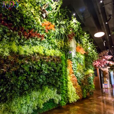 China Traditional Vertical Garden Outdoor Plastic Leaves Wall Artificial Grass Decoration For Hall Hotel Garden And Wedding Fake Plant Fence for sale