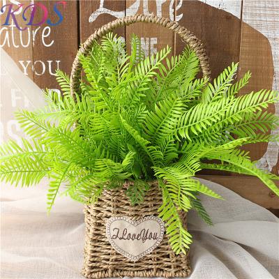 China Minimalist Artificial Plastic Fake Green Leaves Fake Plants for Wall and Wedding Decoration Artificial Grass for sale