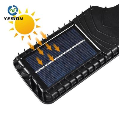 China LED Solar Panel Street Lights High Power Motion Sensor Wall Light Residential Outdoor Garden Security Yard Solar Flood Light for sale