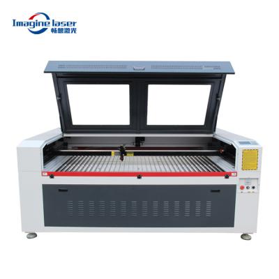 China Engraving and Cutting 1812/1610 100w 150w 200w 300w Acrylic Wood Roll Automatic Industrial Fabric Cutting Machine for sale