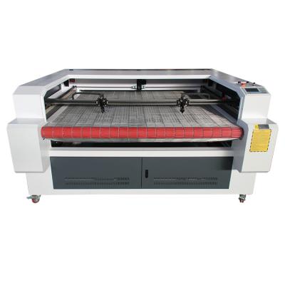 China Engraving and cutting roll to roll CNC fabric pattern laser cutting machine machines 13250 1812 for cutting clothes for sale