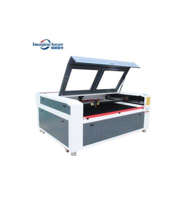 China Premium Wood Leathar Co2 Laser Engraving And Cutting Mixed Cutting Machine for sale