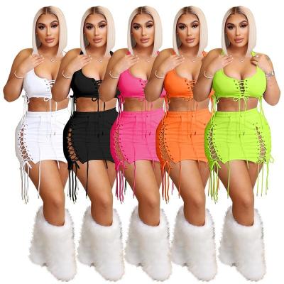 China 2022 Women Set QUICK DRY Two Piece Solid Color Summer Cavity Grains Drawstring Casual Sexy Sleeveless Skirt Outfit for sale