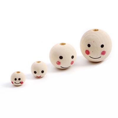 China Baby Teether Toys Hot Sale Wooden Color Hardwood Smiling Wooden Spacer Beads DIY Boy Girl Woodwork Jewelry Making for sale