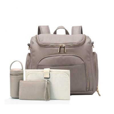 China Wholesale & Customized Custom Made Premium Leather Diaper Bag PU Set Multi Function Diaper Bag With Insulated Bottle Pocket for sale