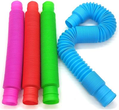 China Toy Efficient Educational Children's Plastic Puzzle Colorful Sensory Stretch Decompression Tube Toy for sale