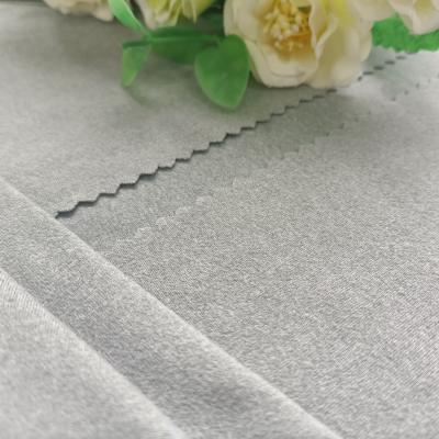 China The latest memory fashion womenswear DTY brush fabric two color milk cloth for sale