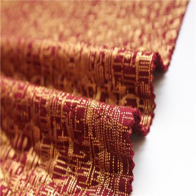 China Hot Selling Memory New Arrival Gold Foil Print Fabric Elastic Jacquard Scuba Fabric For Jacket for sale