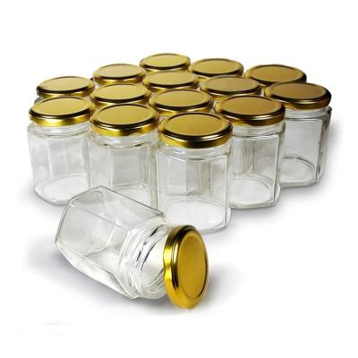 China Wholesale Microwavable Hexagon Jam Glass Empty Honey Jar In Bulk Food 200ml 250ml 380ml 500ml 730ml for sale