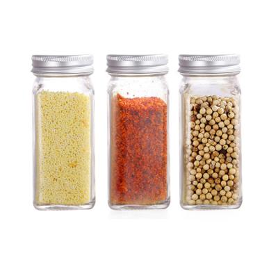 China Steamable 4OZ Square Pepper and Salt Spice Bottle Glass Jar Packaging With Metal Seasoning Lids for sale