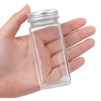 China Empty Custom Steamable 120ml Square Spice Bottles Glass Shaker For Pepper And Salt for sale