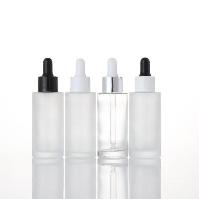 China Personal Care Cosmetic Packaging Shoulder Flat Glass Frosted White Dropper Bottle 100ml Oil for sale