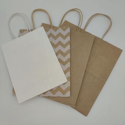 China Biodegradable Custom Logo Kraft Paper Shopping Bag With Handles for sale