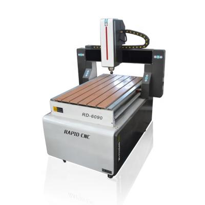 China Hotels Mini 3d Desktop Carving Machine 6090 4 Axis CNC Router With Rotary Device for sale