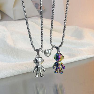 China TRENDY 2Pcs Stainless Steel Astronaut Robot Pendant With Magnetic Necklace for Couple Men Women Spaceman Necklace Valentine's Day Gift for sale