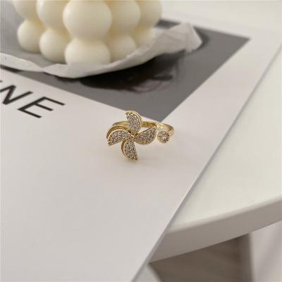 China Nickel-Free Lead-Free New Trendy Rotating Windmill Ring Fashion Luxury Woman's Adjustable Open Ring Delicate Girl Jewelry Gift Accessories for sale