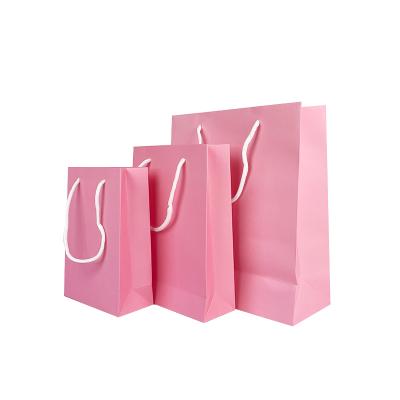 China Recyclable Custom Logo Gift Paper White Paper Bags Retail Made Luxury Shopping Bags For Clothing Tote Bag With Handles for sale