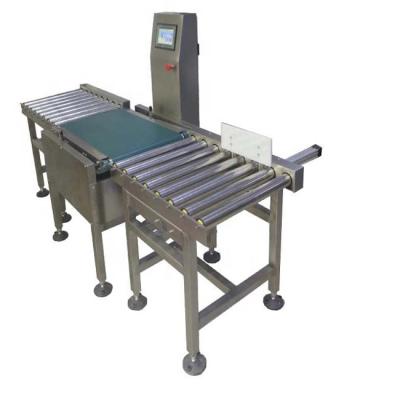 China Detector de metales de la comida del rodillo 50kg de la pantalla LCD táctil de la máquina de la pesa de chequeo IP30 en venta