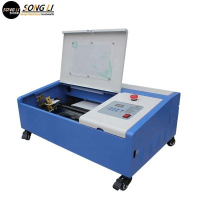 China Air Cooled Nonmetal / Paper Laser CO2 40W / 50W Cutter 3020 Acrylic / Plywood Machine For Nonmetal for sale