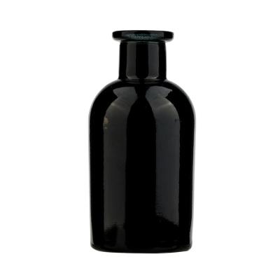 China Personal Care OEM Logo Printed Reusable Empty Glass 50ml Black Perfume Bottle for sale