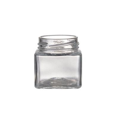 China Viable Custom Transparent 65ml Cube Square Pet Food Jars Glass Jar for sale