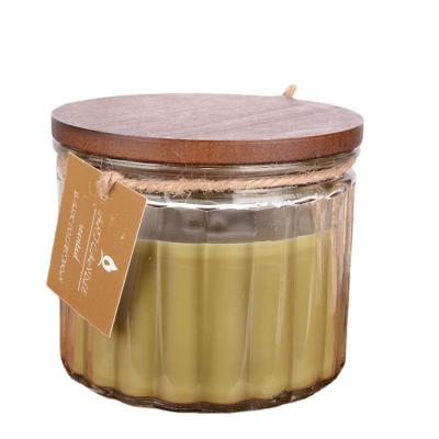 China Weddings customized aromatherapy oil candleSPAEssential tropical style smokeless aroma with wooden lid glass candle for sale