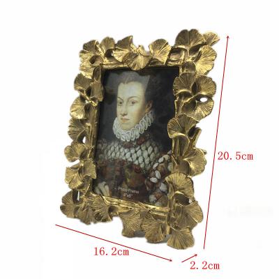 China Home Customized Resin Vintage Tabletop Ornament Gold Leaf Photo Frame For Gifts for sale