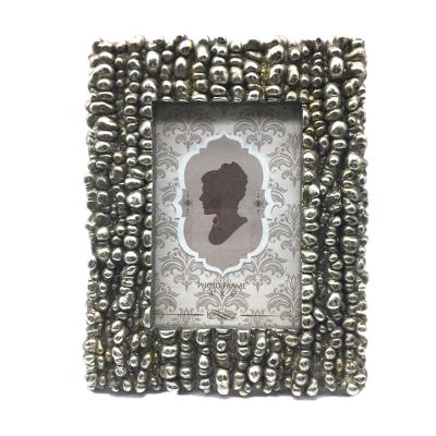 China Customized Irregular Polka Dot Photo Frame Table Picture Frame Handmade Silver Funia Resin Photo Frame for sale