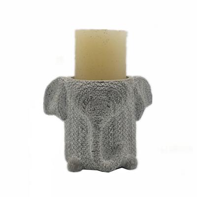 China Latest Creative Rattan Resin Candle Holders Elephant Table Candle Holder Decorations for sale