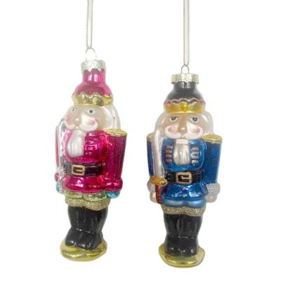 China Chimeras Holiday Decorate Christmas Blown Glass Nutcracker Deocation With Glitter for sale