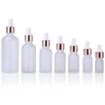 China 5ml Dropper Bottle Cosmetic Transparent Frosted Glass Dropper Bottle Rose Gold Dropper Bottle for sale