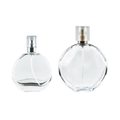 China 50ml 100ml Cosmetic Ellipse Clear Glass Perfume Bottle With Aluminum Pump Spray for sale