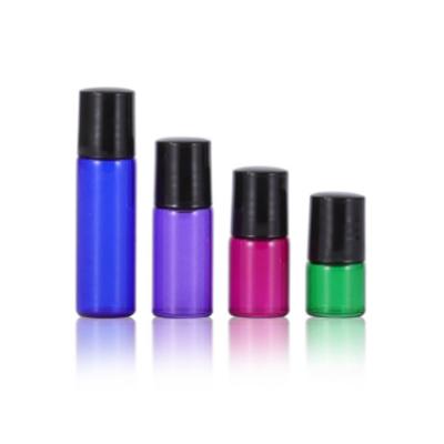 China Cosmetic Small Cover 1ml 2ml 3ml 5ml Black Blue Purple Rose Green Roller Bottles for sale