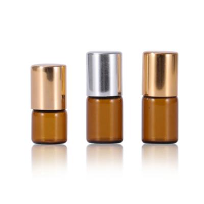 China Custom Cosmetic Rollball Bottles With Sliver Gold Cover 1ml 2ml Drak Tea Roller Glass Bottle for sale