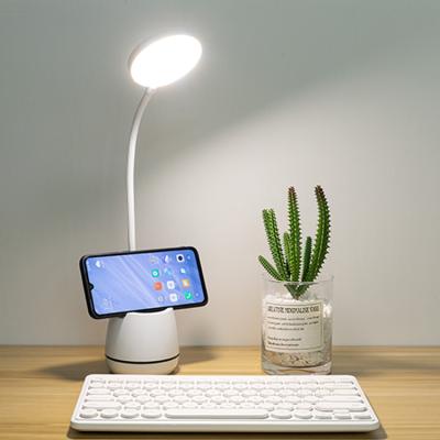 China Modern Drop Shipping Flexible Adjustable Modes Brightness Light With Extra Base Touch Sensor Table Lamp With Pen Phone Holder for sale