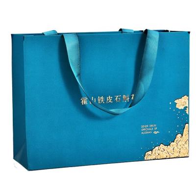 China Recyclable Laminated Coated Cardboard Printing Paper Wedding Bag With Logo Luxury Craft Kraft Paper Gift Apparel Shopping Bag With Logo for sale