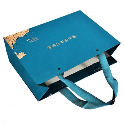 China Best Quality Boutique Jewelry Boutique Gift Food Wrapping Paper Dupont Recyclable Custom Jewelery Gift Clothing Shopping Cosmetic Paper Bag for sale