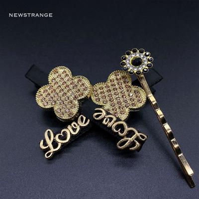 China Decor Factory Wholesale Good Quality Hair Cut New Arrival Four Leaf Clover Rhinestone Bling Sweet Fashionable Hair Pin For Girls for sale