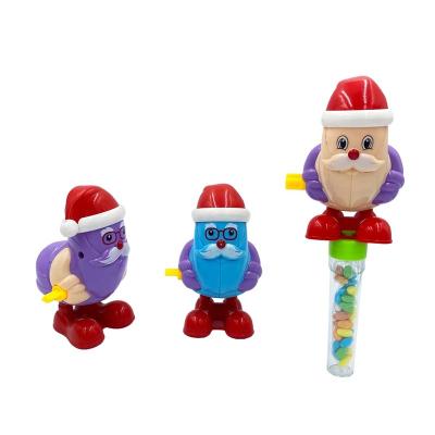 China Cartoon Toys JollySweets Good Quality Christmas Toy Roll Up Santa Toy Plastic Jumping Candy For Kids for sale