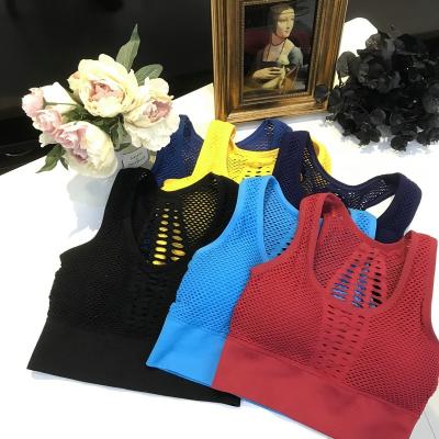 China Dropship Antibacterial Women Seamless Yoga Running Hollow Out Sports Bra With Pattern for sale