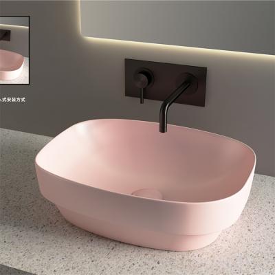 China Easy Clean Semi-Inset Shape Worktop Rectangular Basin Bathroom Ceramic Sink Pink Color for sale